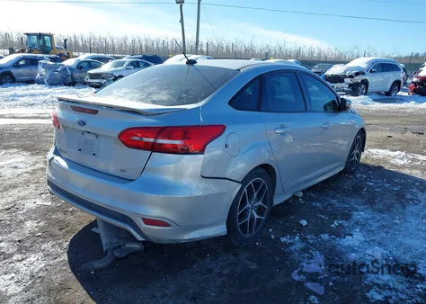 2015 Ford Focus Se z USA, uszkodzony, nr VIN 1FADP3F28FL365319